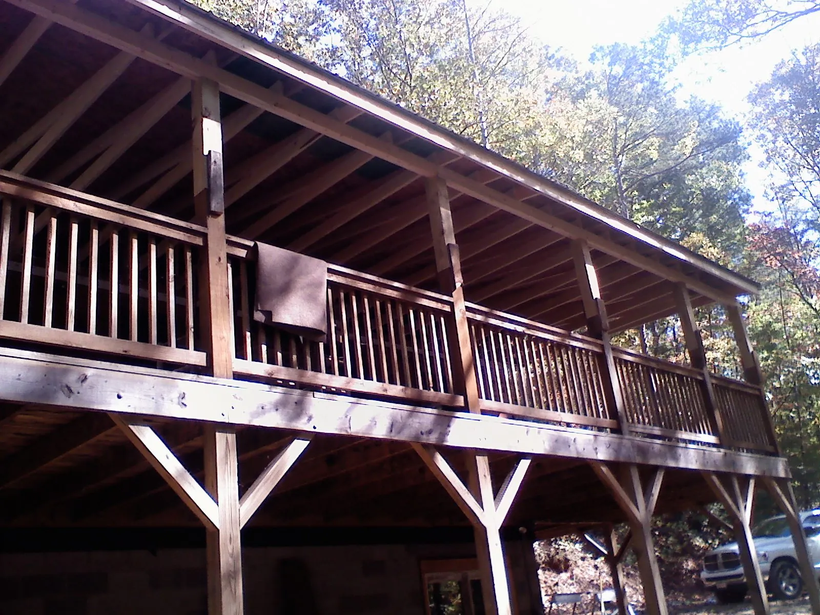 Timber framing under a new elevated porch and deck — Roof Leak Repair in Altoona by Roofing Brothers